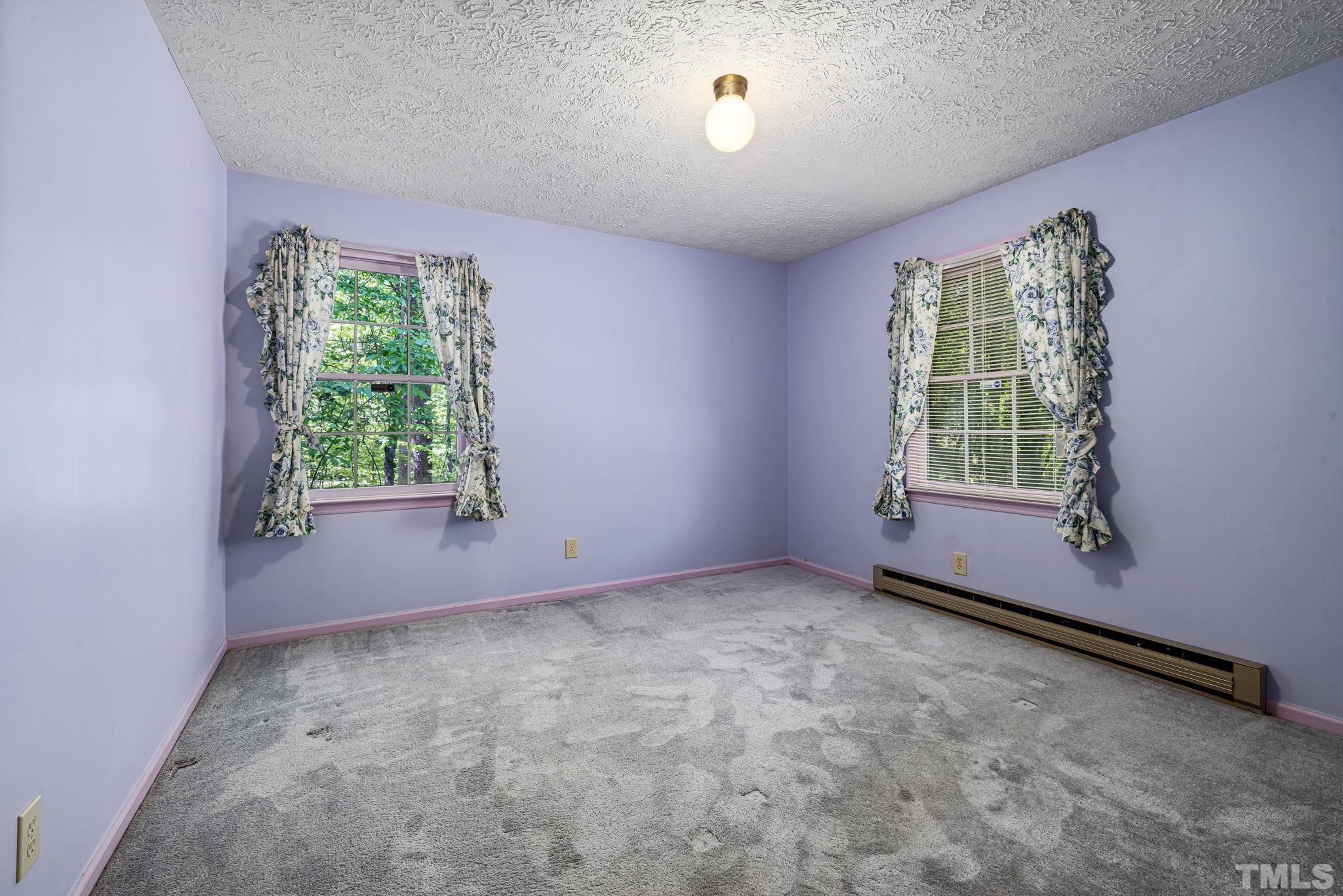 3509 Hurdle Mills Road Roxboro, NC 27574 - Photo 24 of 30 an empty room with a window