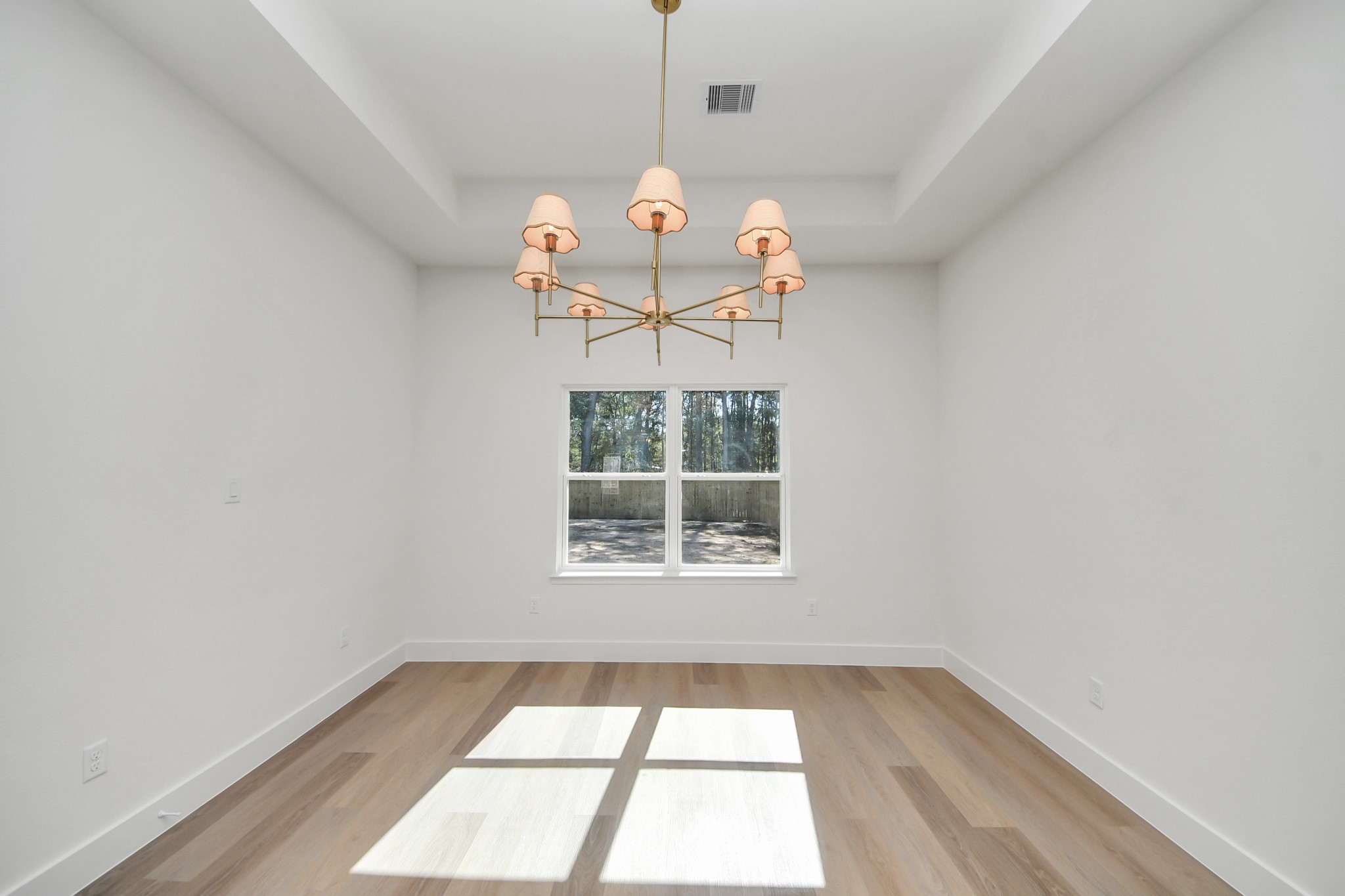 16280 Jeet Street Conroe, TX 77306 - Photo 18 of 44 an empty room with a window