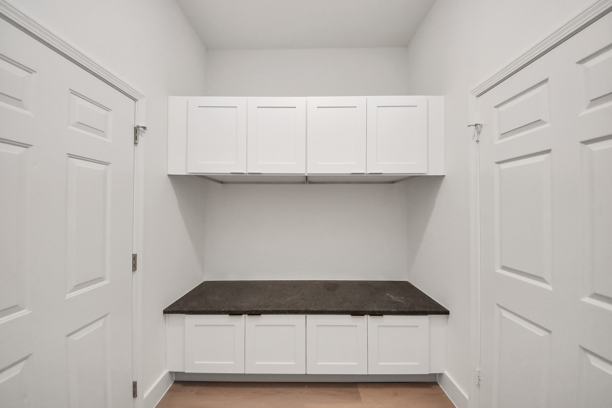 16280 Jeet Street Conroe, TX 77306 - Photo 40 of 44 a view of wooden cabinets