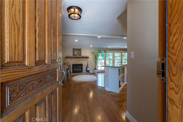 a view of a livingroom with furniture and staircase