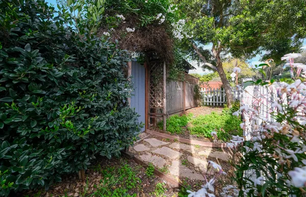 a backyard of a house with lots of green space