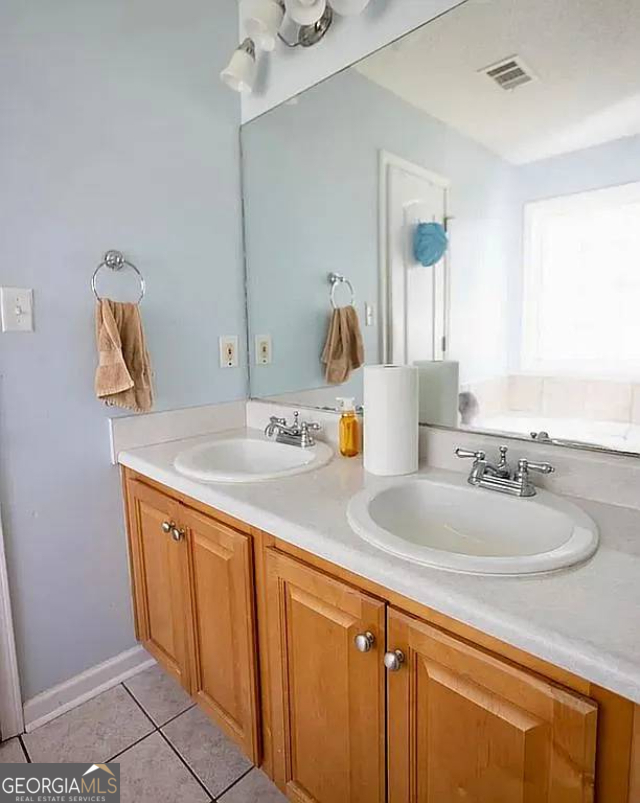 108 Christine Circle Perry, GA 31069 - Photo 13 of 23 a bathroom with a sink and a mirror