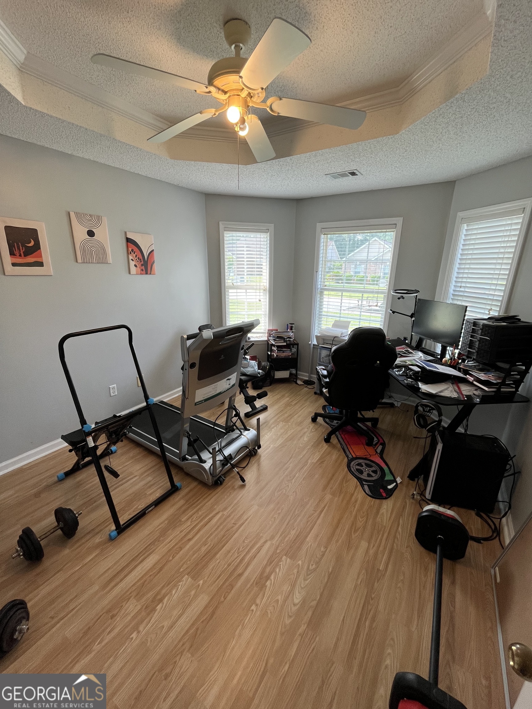 108 Christine Circle Perry, GA 31069 - Photo 18 of 23 a view of a workspace with furniture and a window