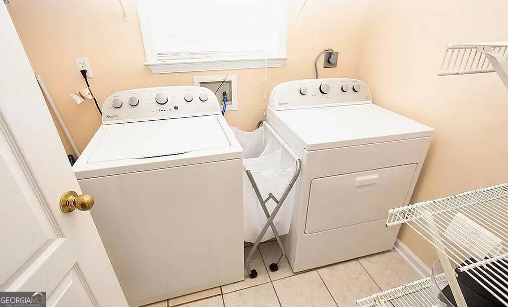 108 Christine Circle Perry, GA 31069 - Photo 20 of 23 a utility room with dryer and washer