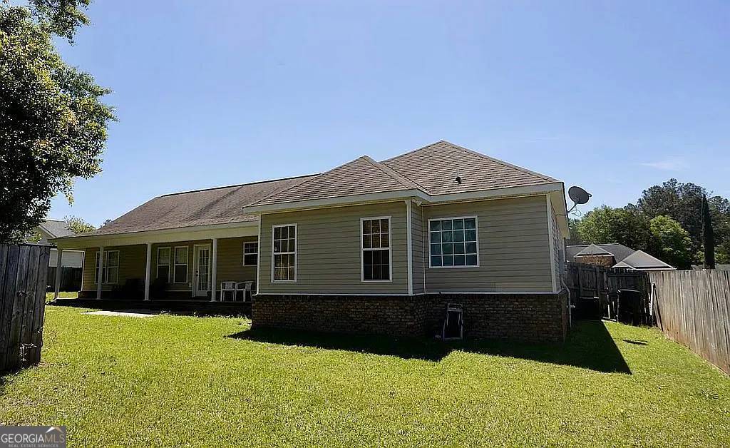 108 Christine Circle Perry, GA 31069 - Photo 23 of 23 a front view of a house with a yard