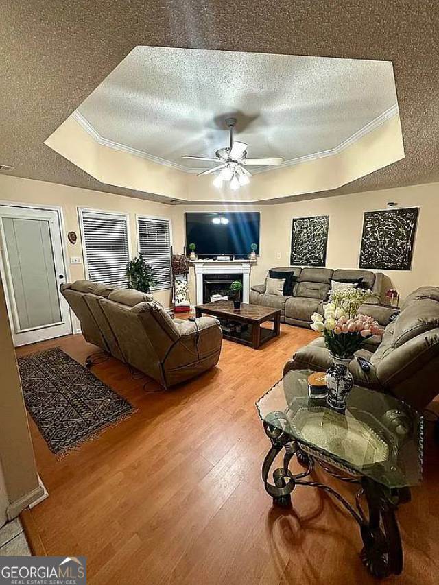 108 Christine Circle Perry, GA 31069 - Photo 5 of 23 a living room with furniture a rug and a chandelier