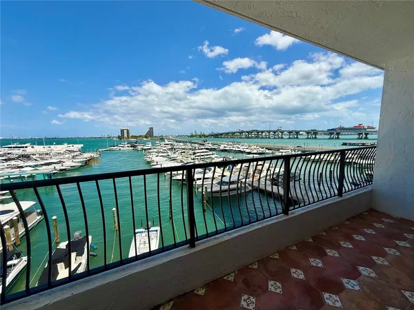 a balcony with wooden floor