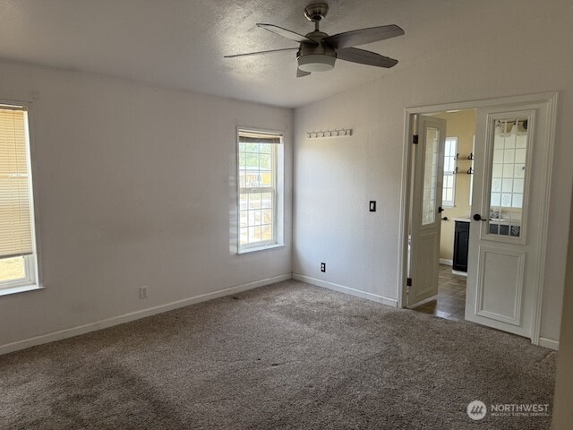 411 Sheets Road Yakima, WA 98901 - Photo 9 of 28 a view of an empty room with a window