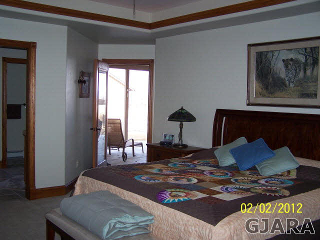 1682 14 Road Loma, CO 81524 - Photo 15 of 27 a living room with furniture and wooden floor