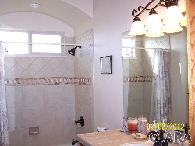 1682 14 Road Loma, CO 81524 - Photo 16 of 27 a bathroom with a sink and shower