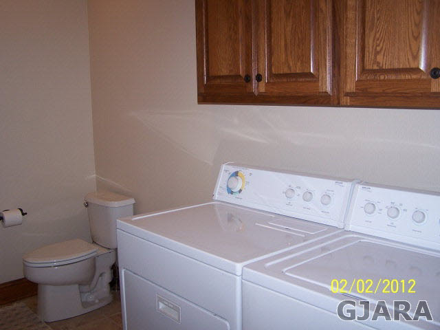 1682 14 Road Loma, CO 81524 - Photo 27 of 27 a utility room with dryer and washer