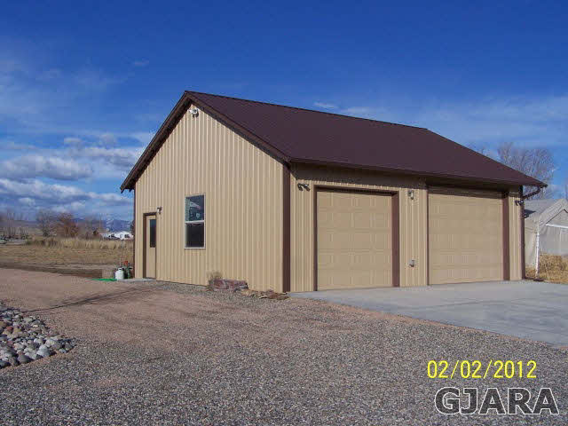 1682 14 Road Loma, CO 81524 - Photo 4 of 27 a view of a house with a backyard