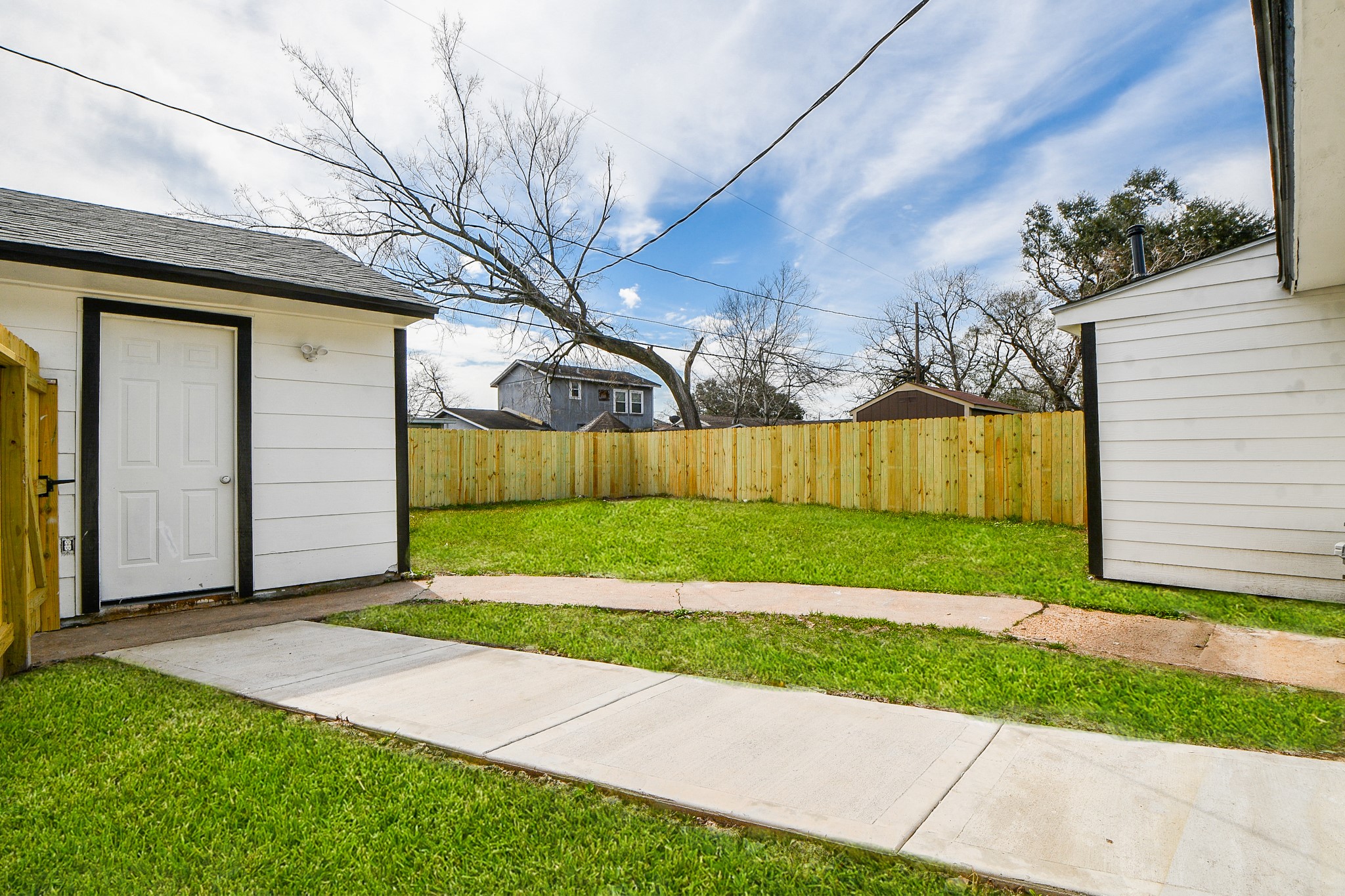 5814 Belneath Street Houston, TX 77033 - Photo 26 of 32 a view of a back yard of the house