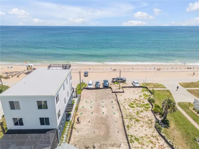 a view of a swimming pool with an ocean view
