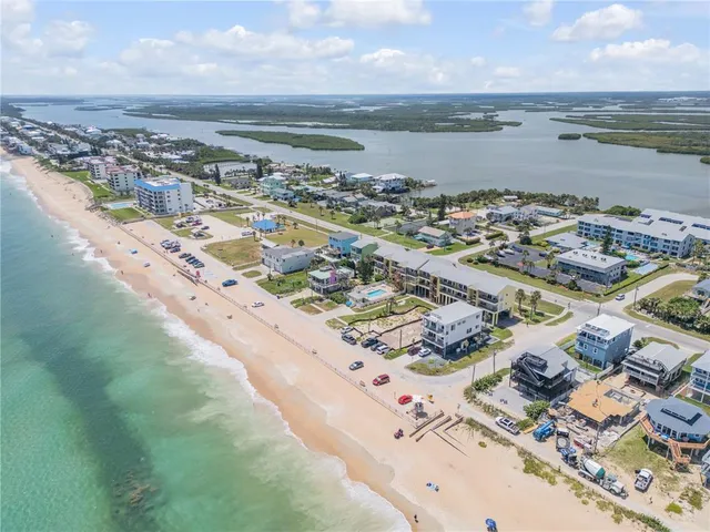 a view of a city with an ocean