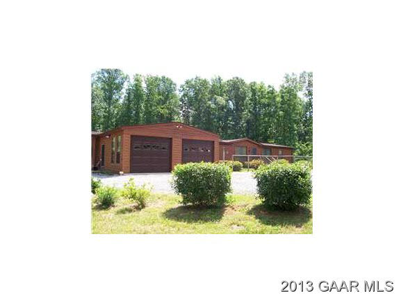 5572 Frank Lane Road Crozet, VA 22932 - Photo 1 of 22 a view of a house with a yard