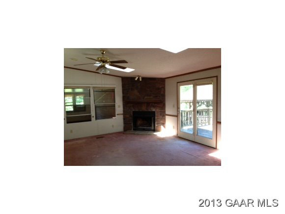 5572 Frank Lane Road Crozet, VA 22932 - Photo 12 of 22 a view of living room with furniture and a fireplace