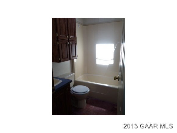 5572 Frank Lane Road Crozet, VA 22932 - Photo 17 of 22 a bathroom with a toilet and a bathtub