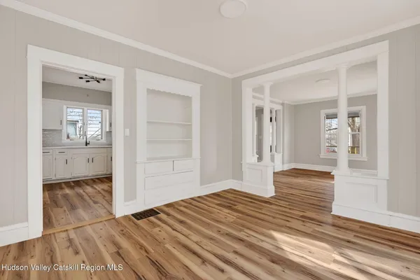 wooden floor and closet in a room