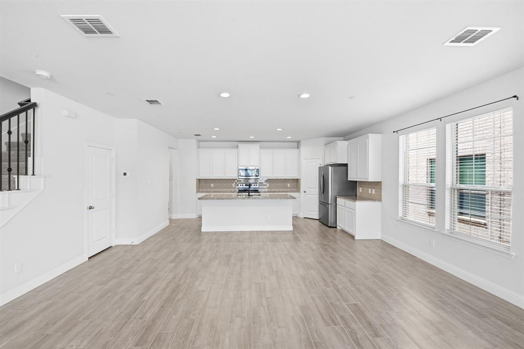 5960 Bursey Road Watauga, TX 76148 - Photo 11 of 38 a view of large kitchen with wooden floor