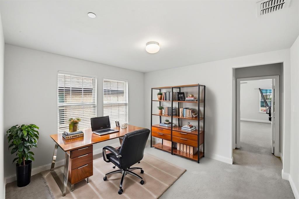 5960 Bursey Road Watauga, TX 76148 - Photo 20 of 38 a view of a workspace with furniture and cabinet