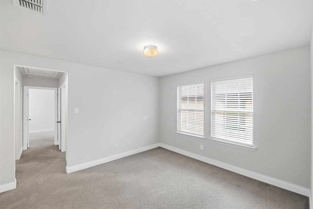 5960 Bursey Road Watauga, TX 76148 - Photo 22 of 38 a view of an empty room with a window