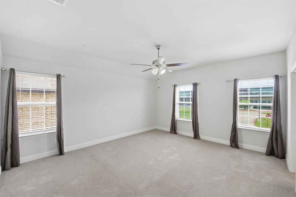 5960 Bursey Road Watauga, TX 76148 - Photo 25 of 38 an empty room with windows