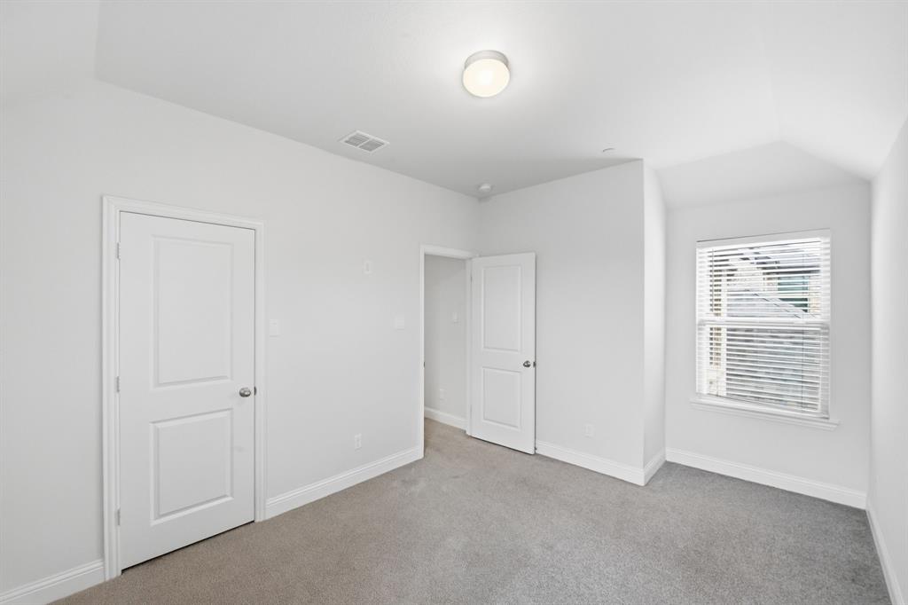 5960 Bursey Road Watauga, TX 76148 - Photo 32 of 38 an empty room with windows
