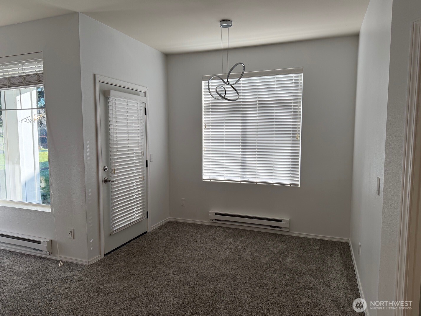 23512 55th Avenue South, Unit 16 Kent, WA 98032 - Photo 12 of 19 an empty room with windows