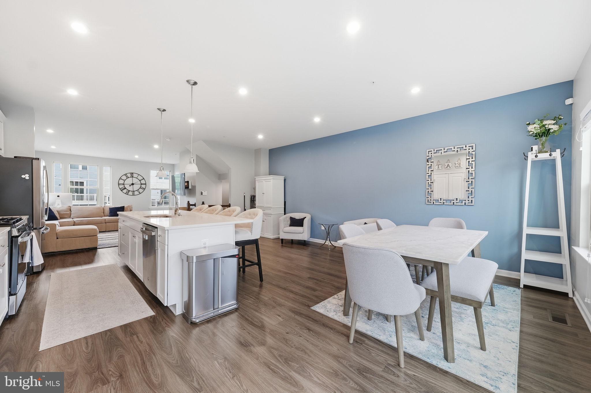 3012 Bretons Ridge Way Hanover, MD 21076 - Photo 10 of 37 a large kitchen with a table and chairs