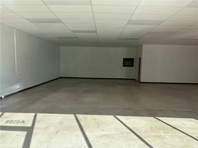 a view of a big room with staircase