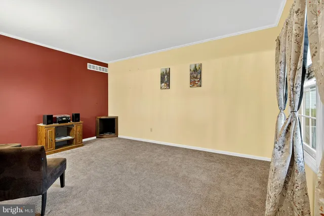 a kitchen with stainless steel appliances granite countertop a sink a stove and a microwave