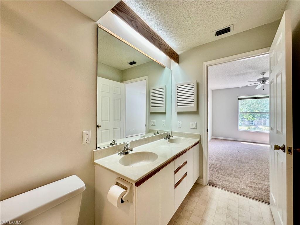 137 Wading Bird Circle, Unit F204 Naples, FL 34110 - Photo 20 of 43 Bathroom 1