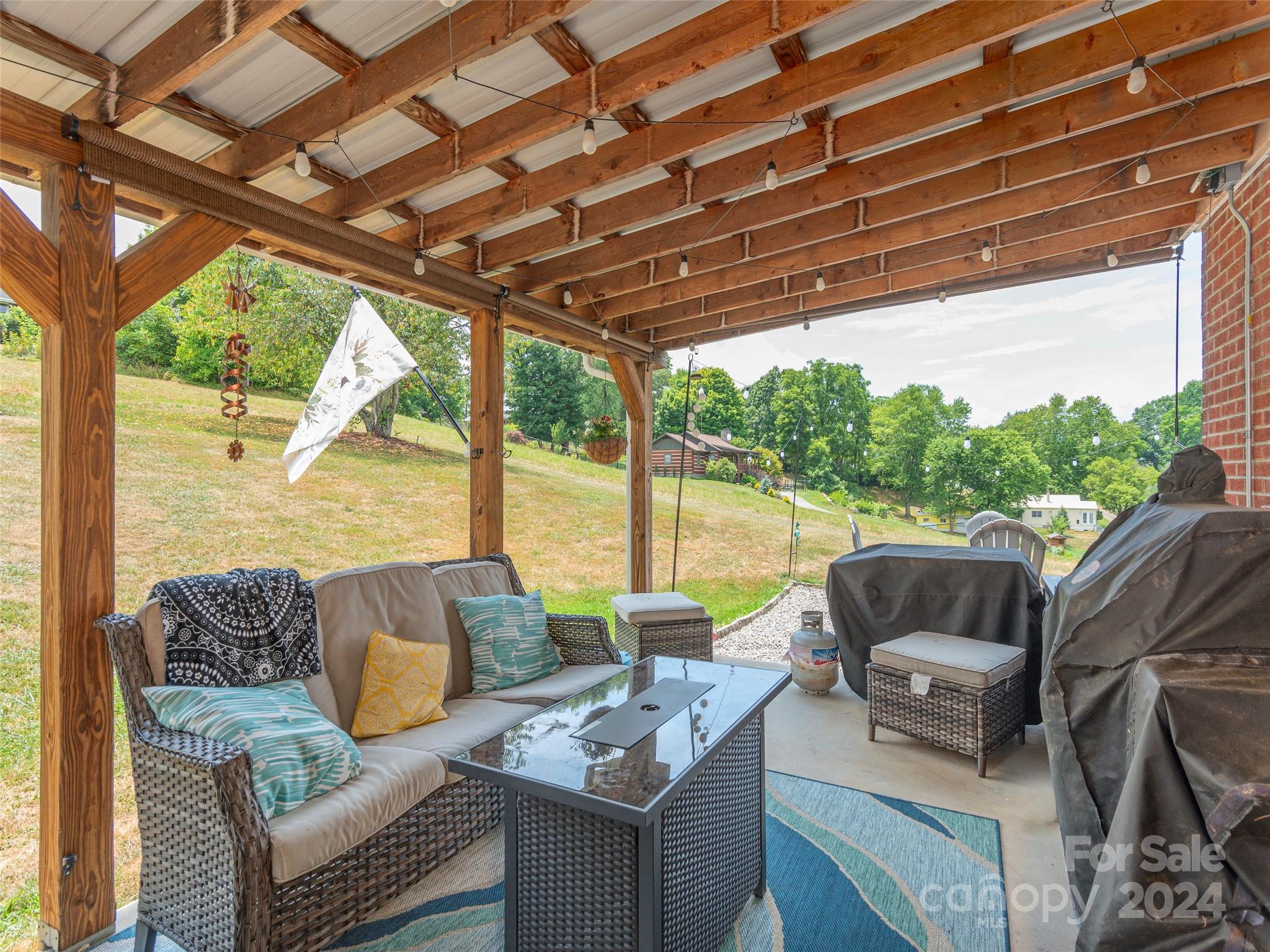 4784 Old Clyde Road Clyde, NC 28721 - Photo 19 of 23 a view of patio with couches and pool