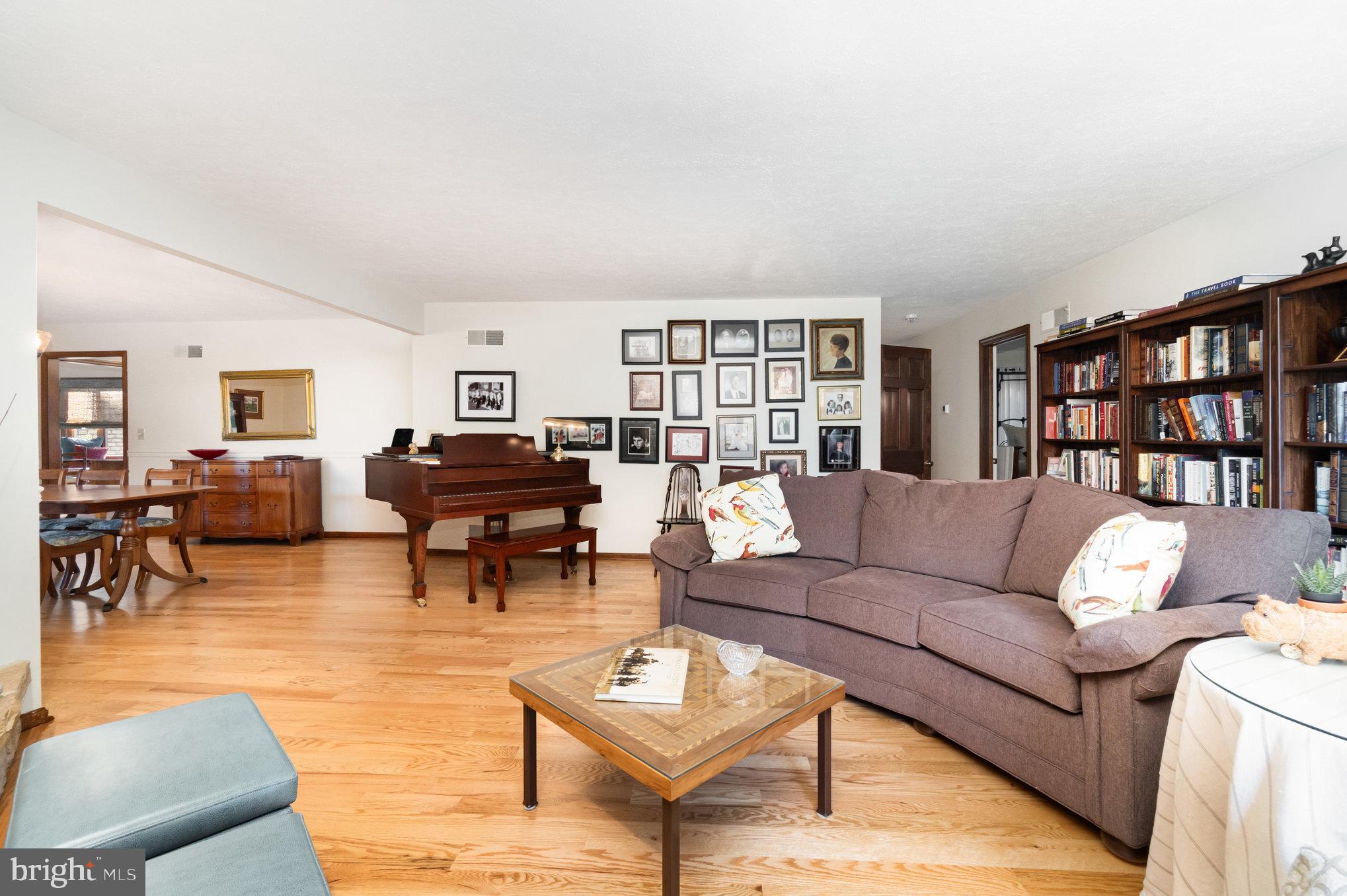 2200 Stoney Point Road East Berlin, PA 17316 - Photo 8 of 75 a living room with furniture and a book shelf