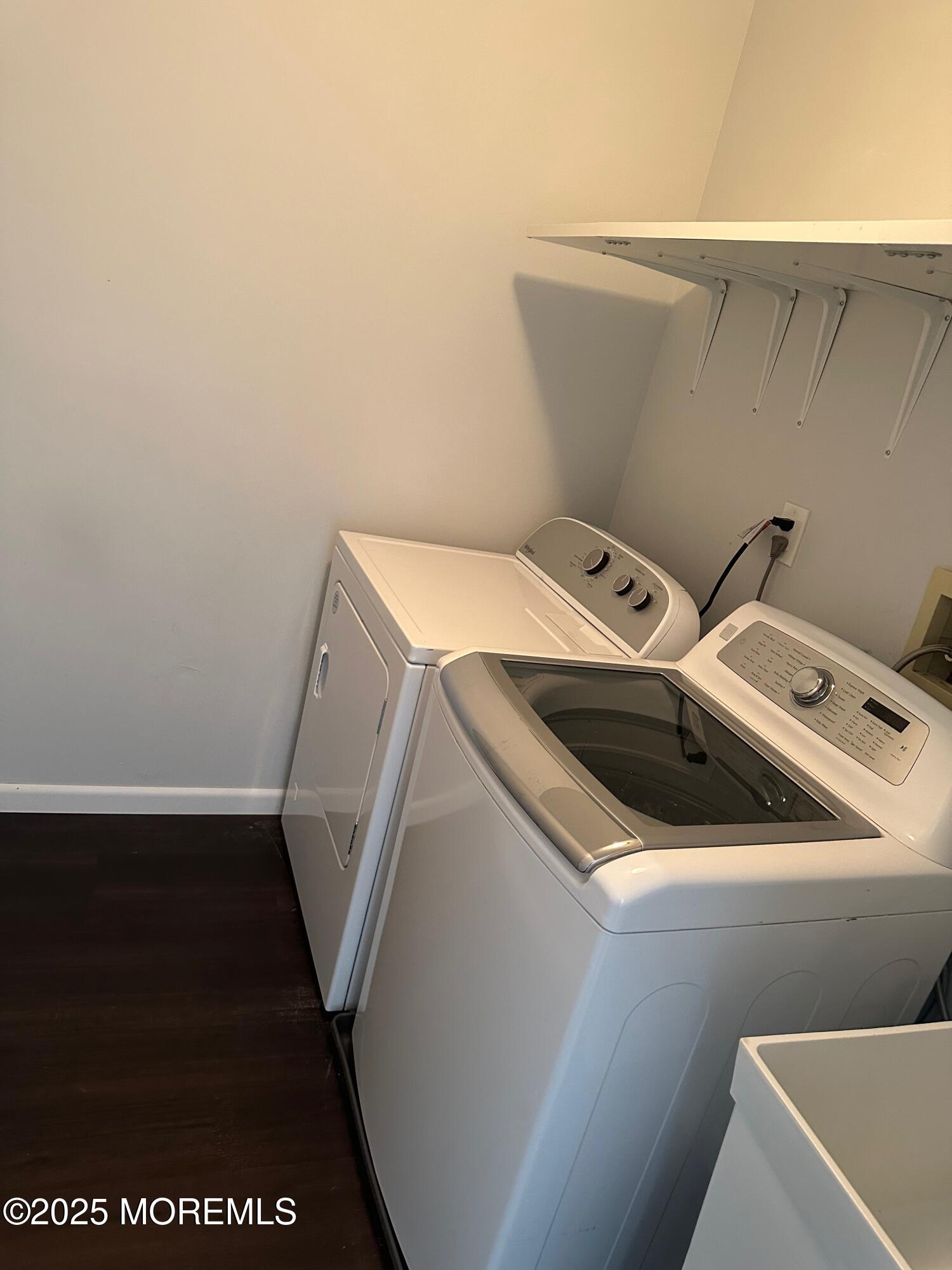 36 Alpine Road, Unit 169 Holmdel, NJ 07733 - Photo 19 of 19 a utility room with dryer and washer