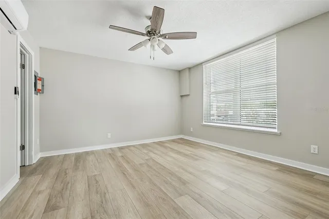 a bathroom with a shower and a toilet