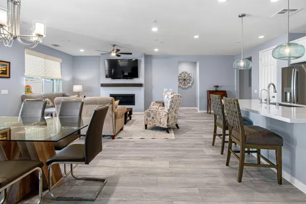 a living room with fireplace furniture and a flat screen tv