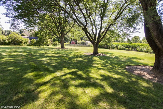2541 Little Rock Road Plano, IL 60545 - Photo 11 of 13 a view of outdoor space with trees all around