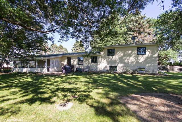 2541 Little Rock Road Plano, IL 60545 - Photo 13 of 13 a view of a house with a yard