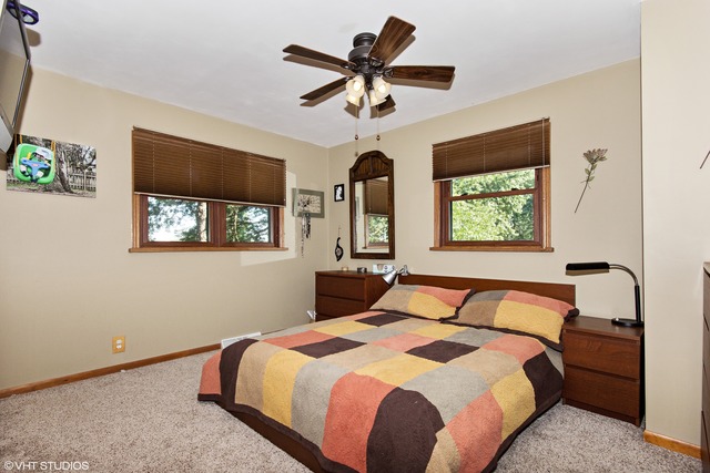 2541 Little Rock Road Plano, IL 60545 - Photo 6 of 13 a bedroom with bed and window