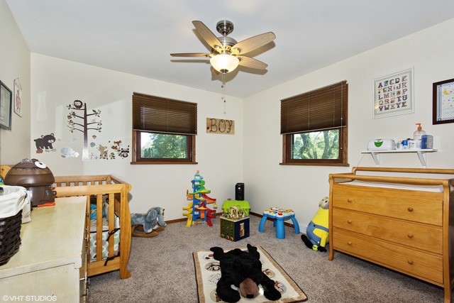 2541 Little Rock Road Plano, IL 60545 - Photo 7 of 13 a living room with furniture and a window