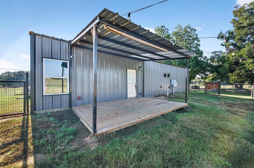 1700 Elmore Road Denison, TX 75021 - Photo 28 of 36 a view of a house with a yard