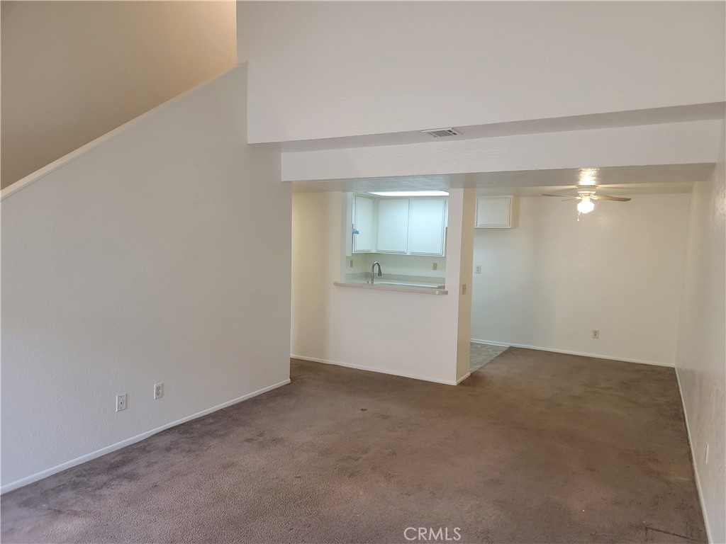 435 West 9th, Unit A7 Upland, CA 91786 - Photo 3 of 13 a view of an empty room