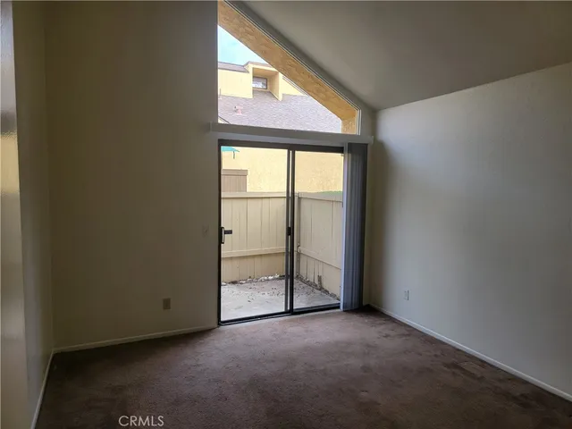 an empty room with sliding door