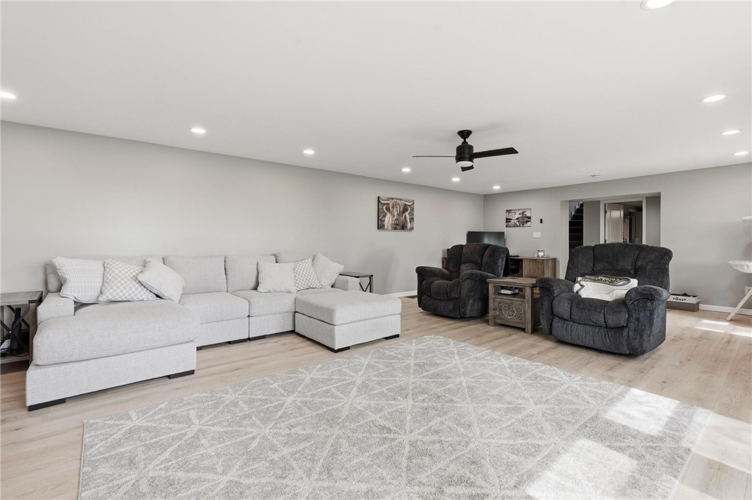 2950 Fairfield Pike Springfield, OH 45502 - Photo 11 of 48 This versatile living space features modern lighting and durable flooring for comfortable gatherings.