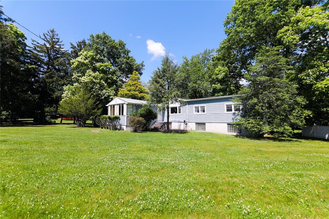 120 Scotland Hill Road Chestnut Ridge, NY 10977 - Photo 1 of 1 a house view with a garden space