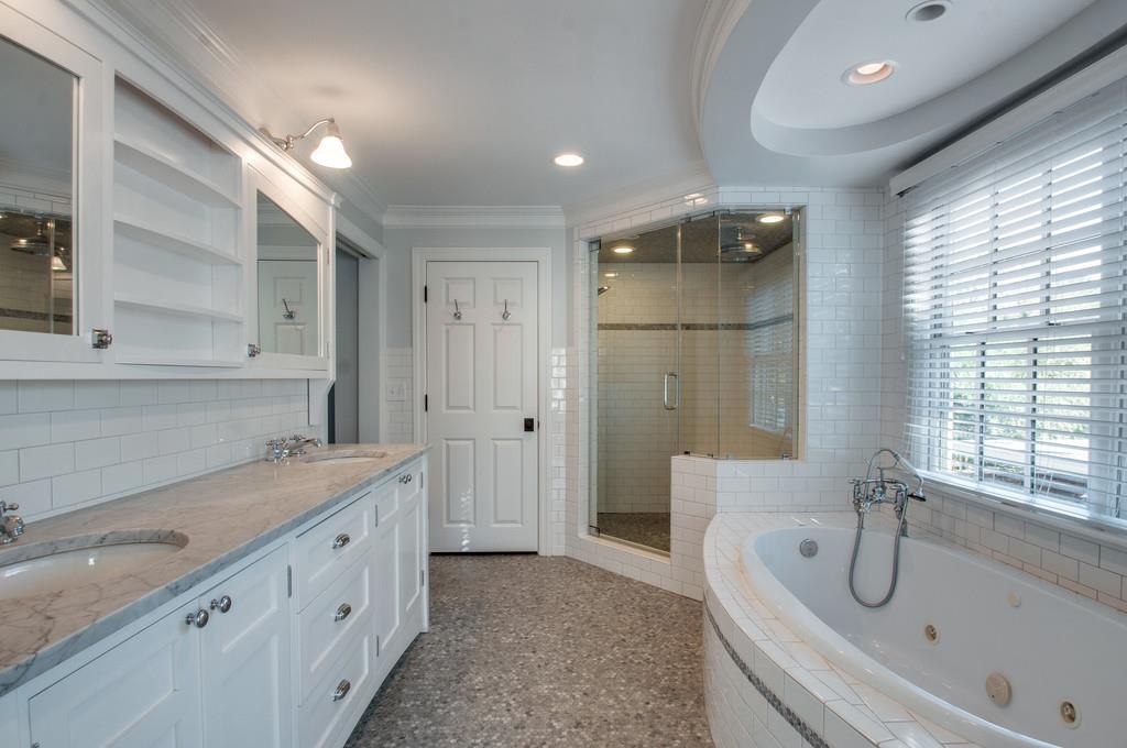 308 Page Road Nashville, TN 37205 - Photo 11 of 22 You’ll love this gorgeous master bath. Separate shower and garden tub. Double vanity. Lots of storage space.