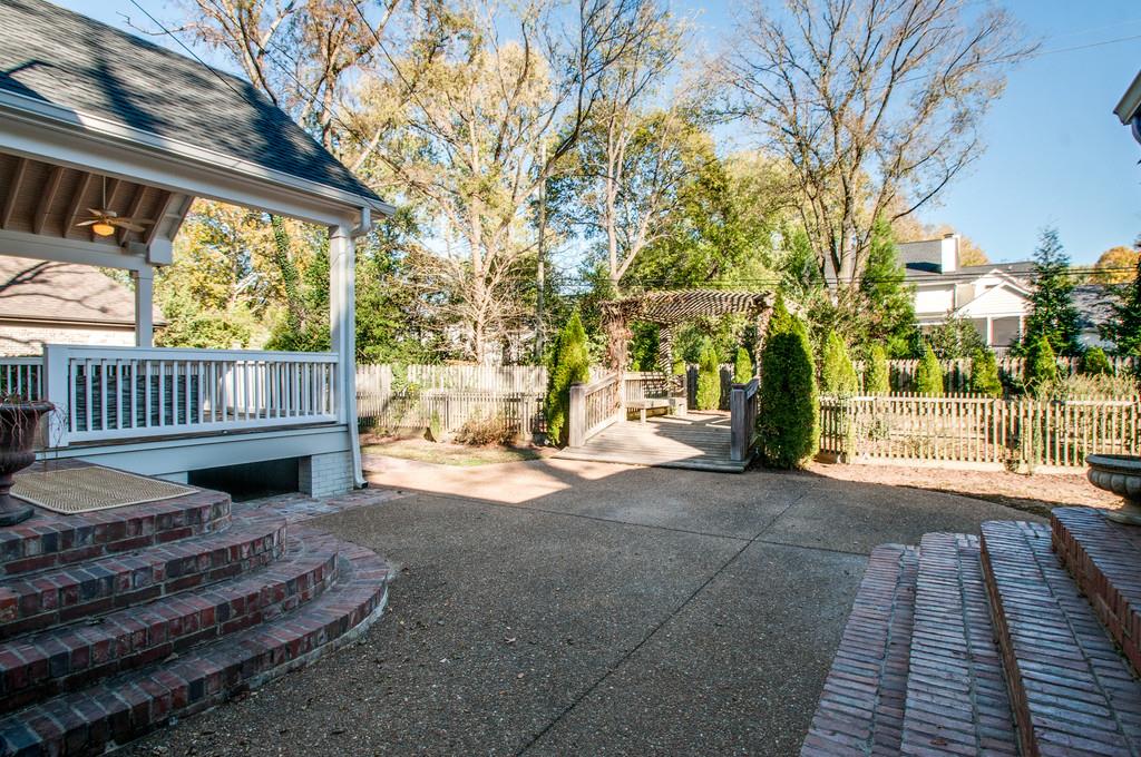 308 Page Road Nashville, TN 37205 - Photo 20 of 22 Imagine this outdoor space in the Spring when the flowers are blossoming and twinkling lights strung along the arbor. Let the adults enjoy cocktails while the kicks play in the yard.