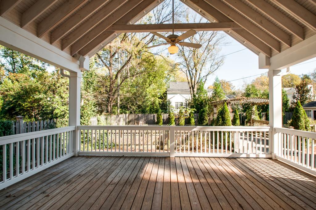 308 Page Road Nashville, TN 37205 - Photo 5 of 22 Beyond the French doors is a covered deck that overlooks the spacious and well landscaped backyard and arbor.